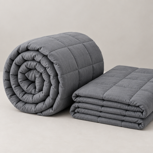 Grey weighted blanket rolled and folded to show its thickness